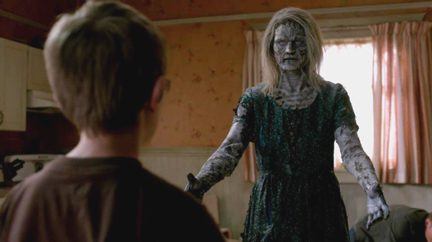 Timmy's mom holds our her arms to him. Timmy's mom holds our her arms to him.